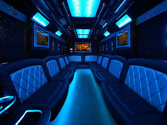 Numerous HD flat screens in party bus Canton, OH